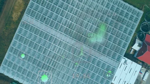 Greenhouse panels being shown with code text overlay and glowing 3D render Stock Footage 309097928