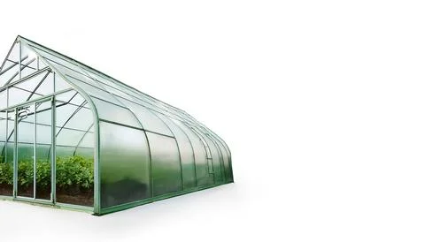 Greenhouse is a structure designed to regulate the temperature and humidity.. Stock Photos