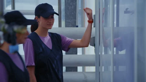 Greenhouse Workers Use Key Bracelet at Checkpoint Stockbeeldmateriaal 313530664