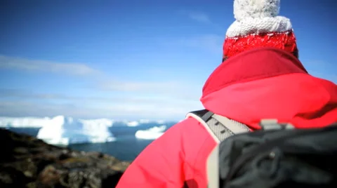 Greenland Arctic Circle Polar Icecap Melting Glacial Mass Ice Floe Female Travel Stock Footage