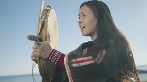 Greenlandic drum dance and sing. East Greenlandic drum. Low portrait shot. Stock Footage 204440391