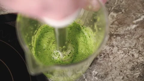Greens in a blender. Stock Footage 147110622