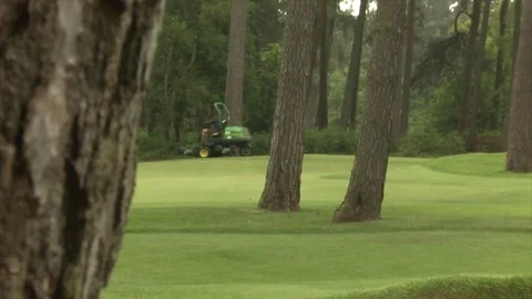 Greens keeper mows a golf green. 動画素材 80468672