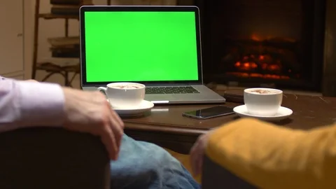 Greenscreen mockup laptop computer on cafe table. Stock Footage 98441504