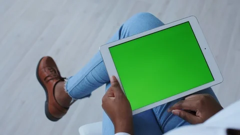 Greenscreen or Chroma Key Tracking. African American Girl with Mobile Tablet PC Stock Footage 121098378