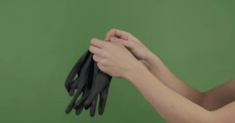 GREENSCREEN || putting on single use gloves  || 4K Stock Footage 126578562