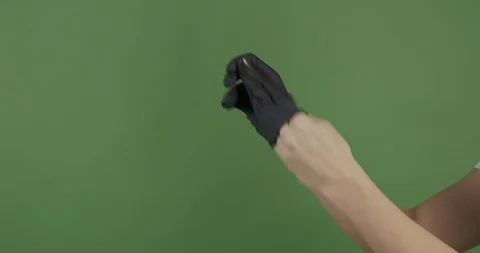 GREENSCREEN || takng off single use gloves  || 4K Video stock 126577812
