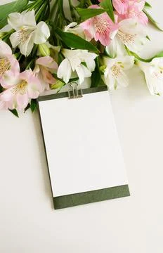 Greeting card, invitation, blank paper mockup with copy space and pink and white Stock Photos