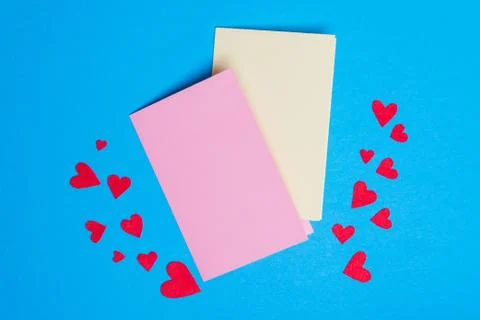 Greeting cards lying on the background Stock Photos
