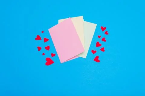 Greeting cards lying on the background Stock Photos