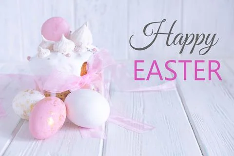 Greeting Easter card. Easter cake, eggs with a congratulatory inscription on a Stock Photos
