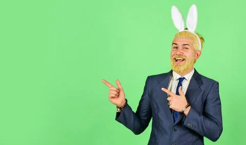 Greetings concept. Having fun. Funny boss. Easter activities for office. Bearded 库存照片
