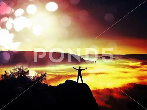Greetings to Sun. Happy man gesture raised arms. Funny hiker with raised han Stock Photos