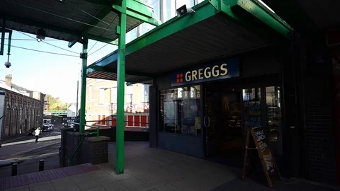 Greggs bakery in Longton, in the now mostly vacant market area Stock Footage 103565768
