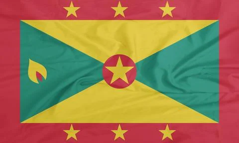 Grenada Flag waving in the steady wind Stock Photos