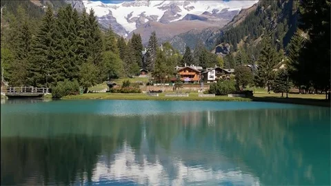 Gressoney Saint Jean, Aosta Valley, Italy. Time lapse of Lake Gover and Monte Ro Stock Footage