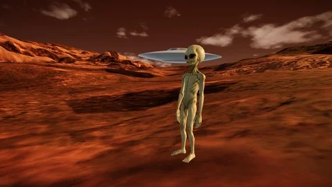 Grey Alien on Mars like Planet Video stock 106824775