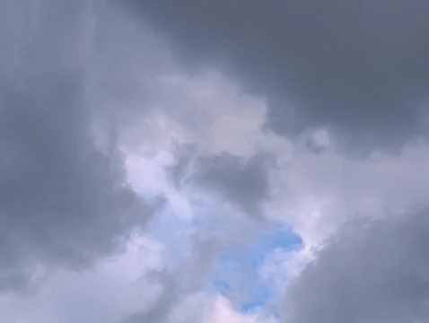 Grey and bluish dramatic cloudscape before storm Stock Photos