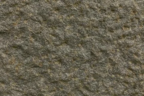 Grey and cream coloured bumpy stone background Stock Photos