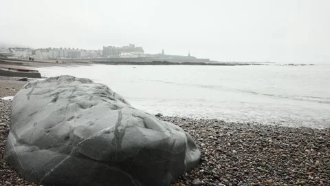 Grey and overcast Aberystwyth beach scene Stock Footage 182491454