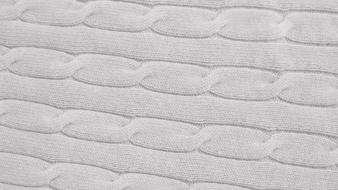 Grey and pink wool knitted fabric Stock Footage 137655445