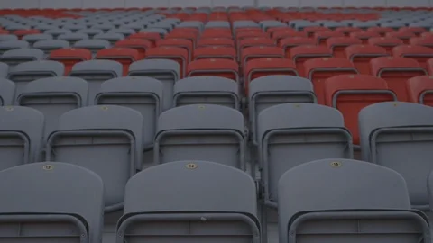 Grey and Red Empty Seating In Stadium Stock-Footage 118096251