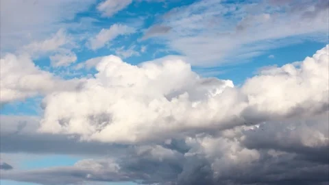 Grey and white clouds moving fast Stock Footage 131366912