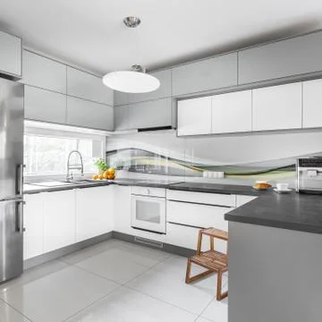 Grey and white kitchen Stock Photos