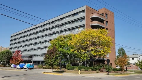 Grey Apartment Building Xfinity and Comcast Towers Stock Footage 219097252