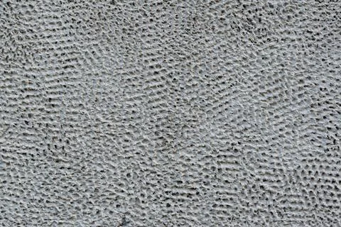 Grey area with many small dimples Stock Photos