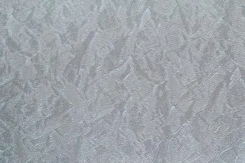 Grey background made of paper material with an embossed pattern Foto stock