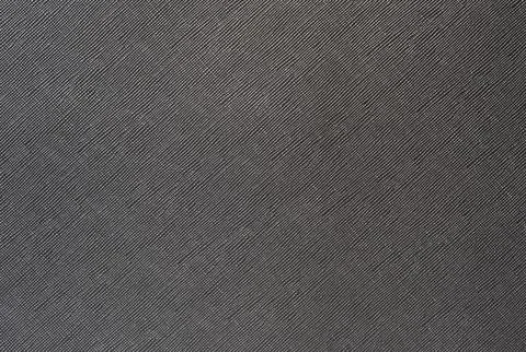 Grey background from a textile material with wicker pattern, closeup. Stock Photos