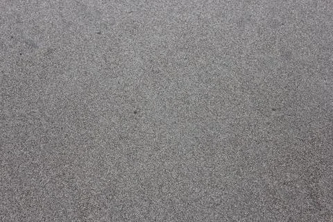 Grey beach sands texture background Stock Photos