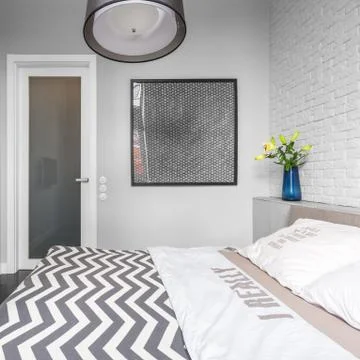 Grey bedroom interior Stock Photos