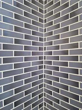 Grey black brick wall texture background Stock Photos