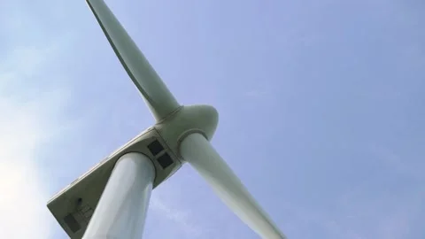 Grey blades rotate as energy source generating electricity Stock Footage 157321060
