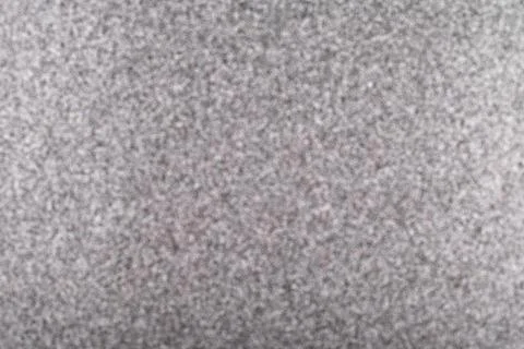 Grey blurred abstract background, tiny bokeh texture . Foto stock