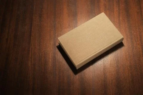Grey book on the table Stock Photos