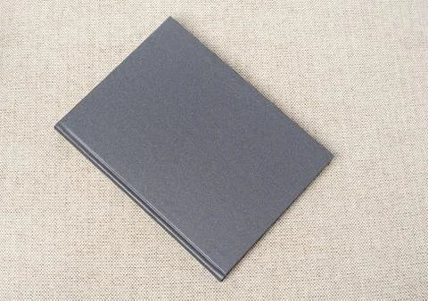Grey book on the table Stock Photos
