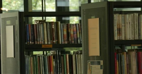 Grey Bookshelves With Rows Of Books Elevator Lifts Up Windows Indoors John Paul Stock Footage 54325868
