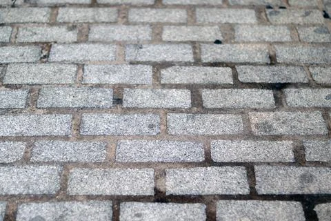 Grey brick floor background texture Stock Photos