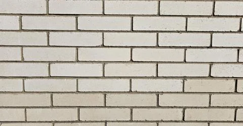 Grey brick wall, abstract background texture. Stock Photos