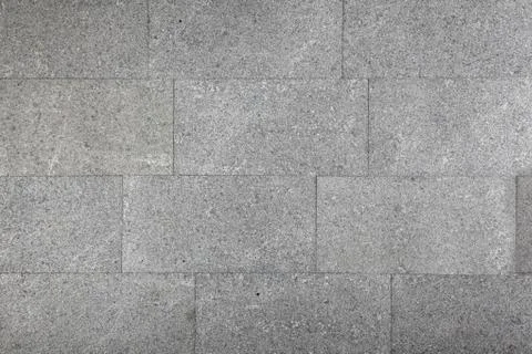Grey brick wall b Stock Photos