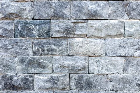 Grey brick wall background,  brick wall texture, dark texture. Stock Photos