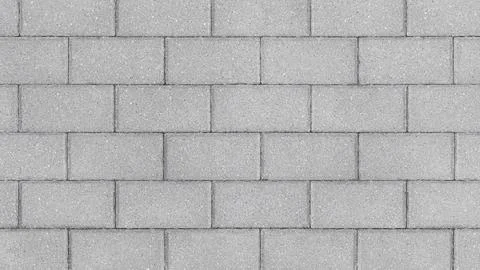 Grey brick wall background close up. Gray stone tile block background Stock Photos
