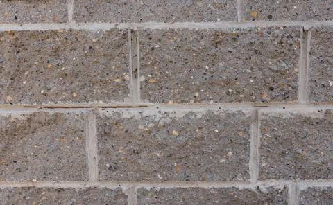Grey brick wall. Block background Stock Photos