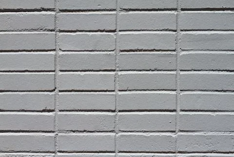 Grey brick wall close Stock Photos