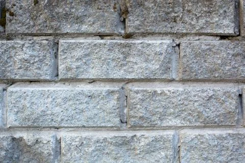 Grey brick wall. Closeup. Background Stock Photos