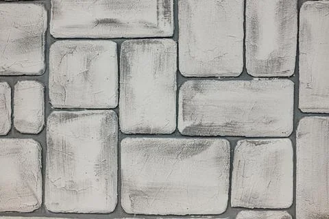 Grey brick wall. Large brick on the wall Stock Photos