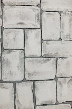 Grey brick wall. Large brick on the wall Stock Photos